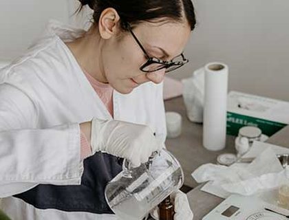 A laboratory specialist preparing samples